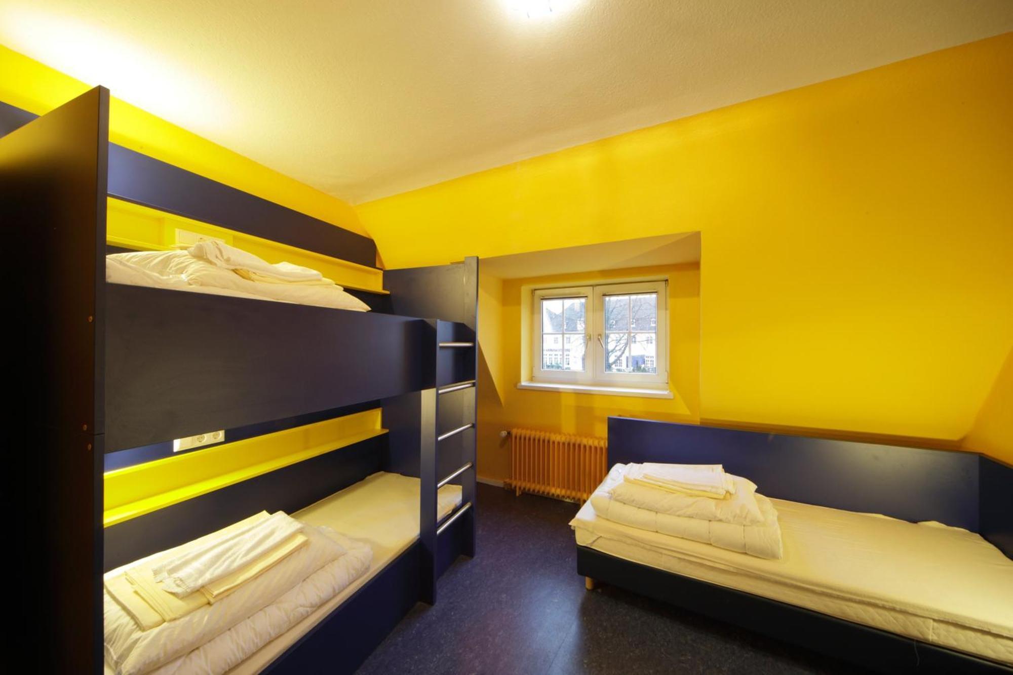 Dreibettzimmer mit Gemeinschaftsbad